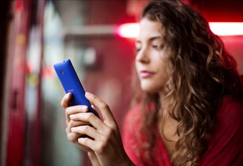 HTC smartphone in the hands of a girl