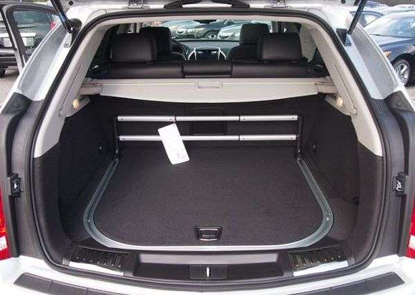 Рено лагуна универсал багажник. Cadillac SRX 2008 багажник. Cadillac SRX 2011 багажник. Кадиллак SRX 2 багажник. Cadillac SRX II 2009-2012 багажник.